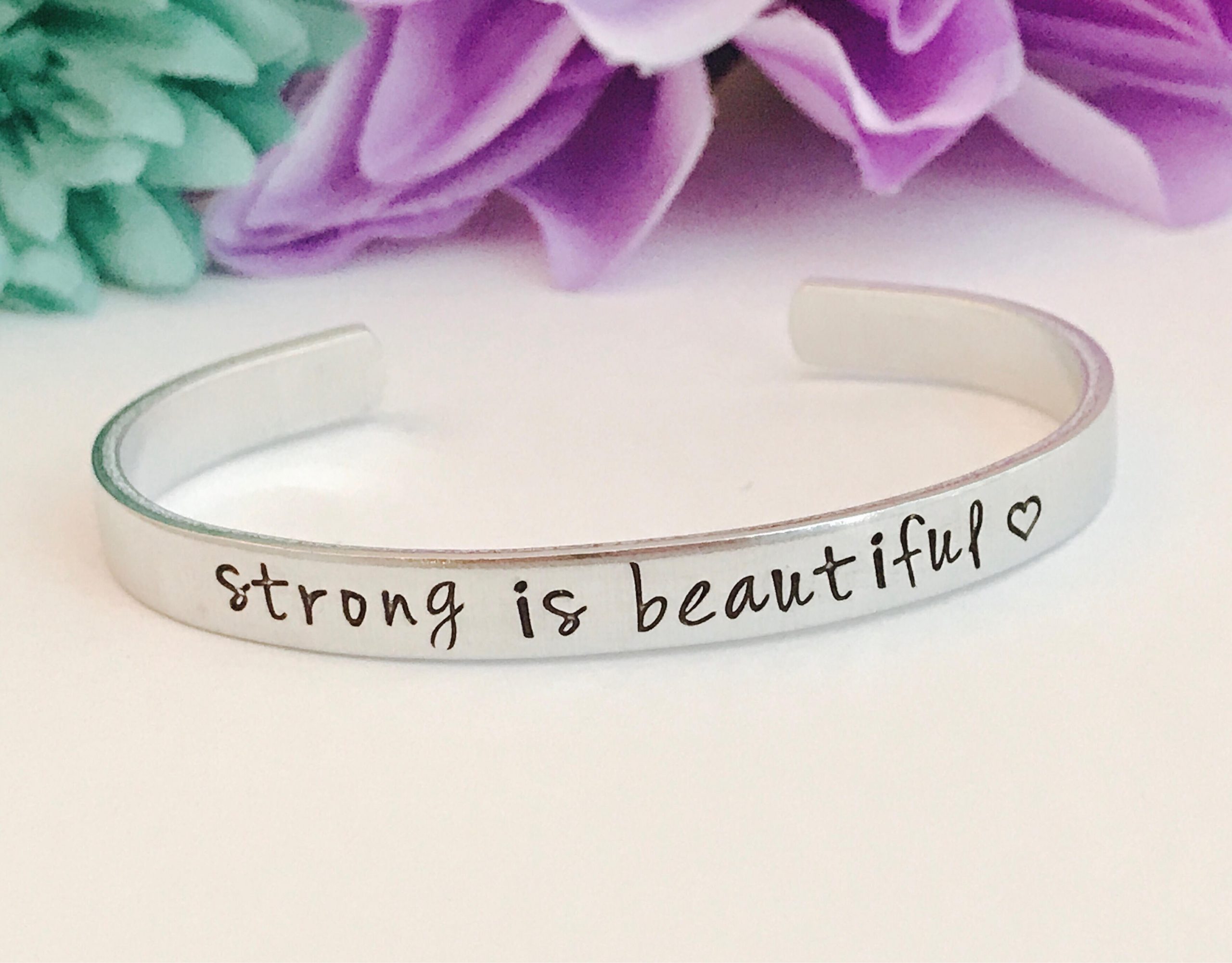 Strong is beautiful , inspirational cuff bracelet inspirational stamped message Hand stamped